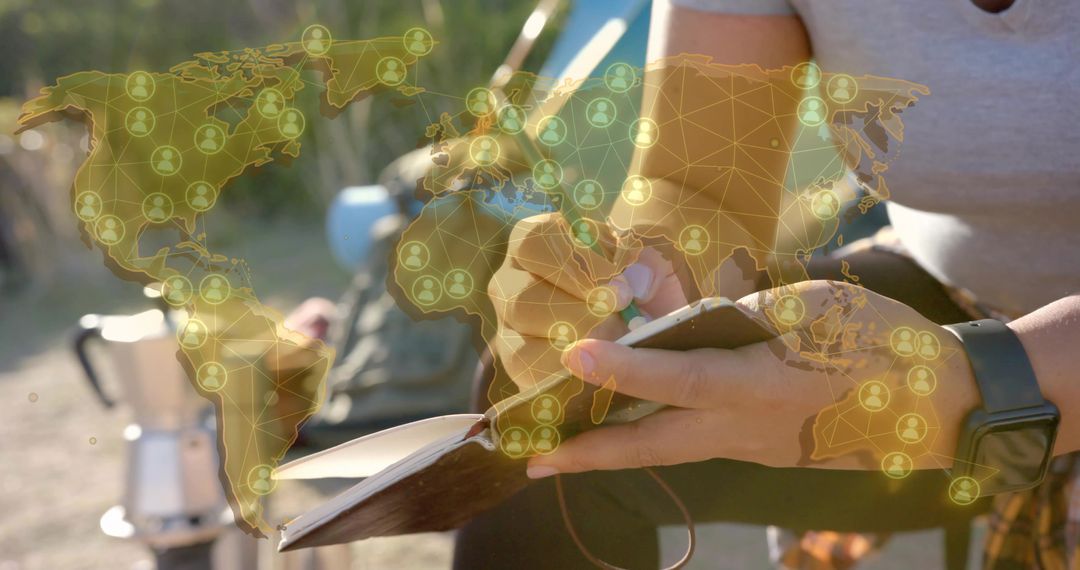 Traveler Writing in Notebook with Global Connectivity Overlay