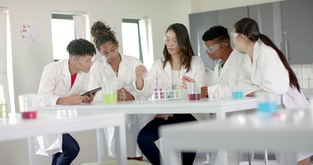 Diverse Students Collaborating in High School Science Lab