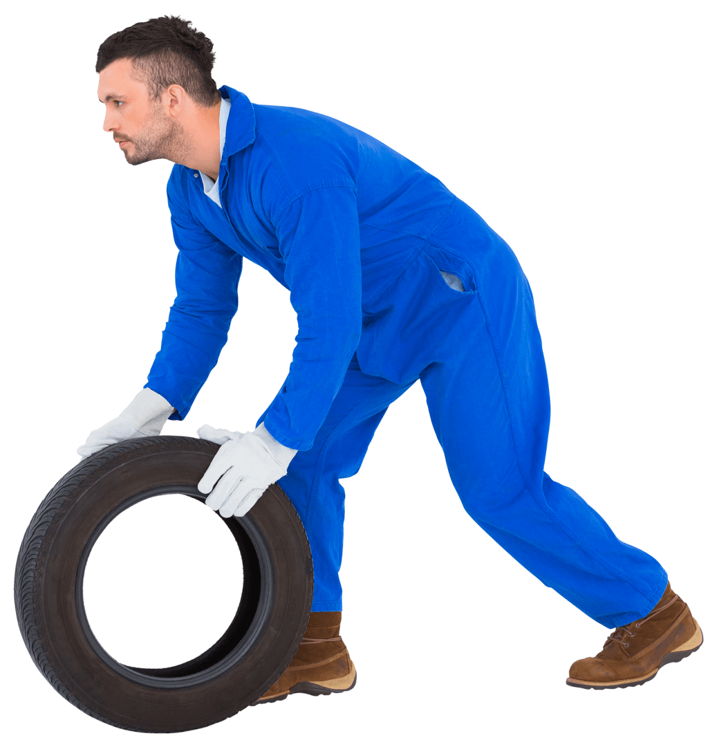Mechanic Pushing Truck Tire in Blue Uniform Transparent Background