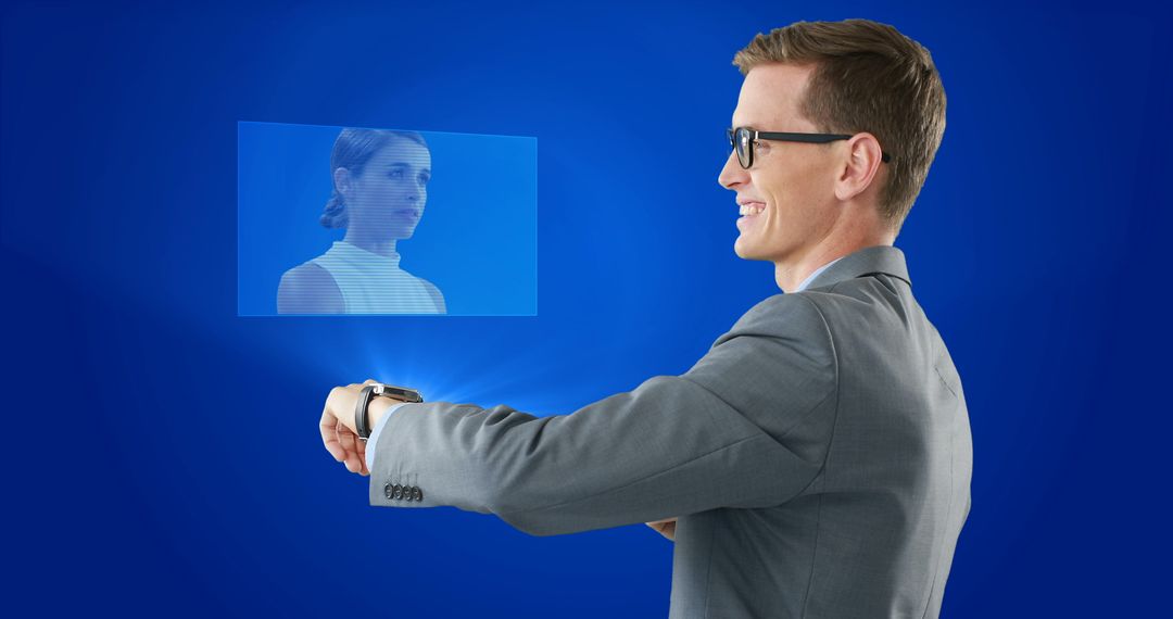 Businessman Interacting with Smartwatch Hologram Display