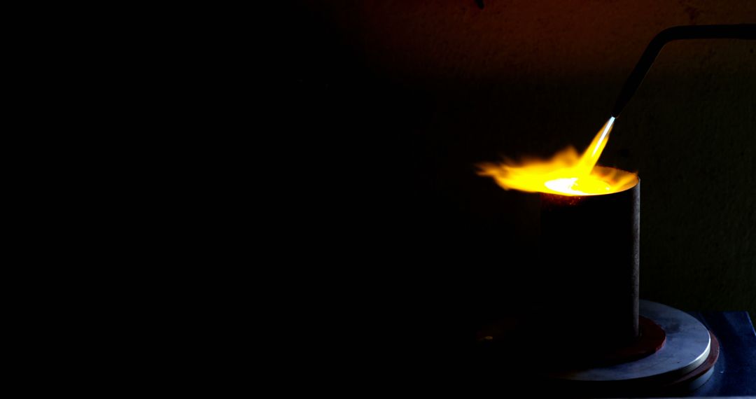 Molten Metal Being Heated in a Crucible with a Blowtorch - Free Images, Stock Photos and Pictures on Pikwizard.com