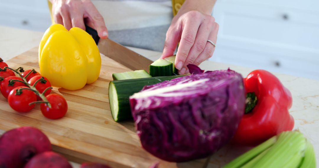 Person Chopping Vegetables in Kitchen for Healthy Meal - Free Images, Stock Photos and Pictures on Pikwizard.com