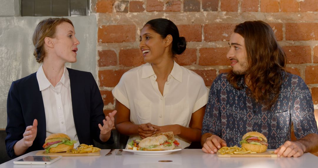 Diverse Group Enjoying Casual Meal in Conversation Setting