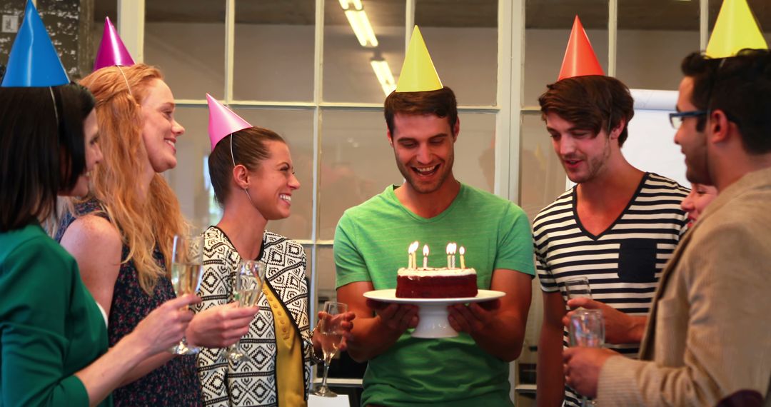 Office Colleagues Celebrating Birthday with Cake and Party Hats - Free Images, Stock Photos and Pictures on Pikwizard.com