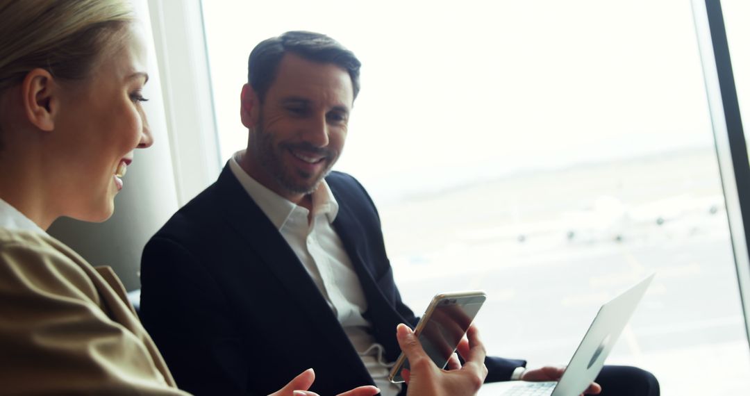 Business Professionals Networking at Airport Lounge