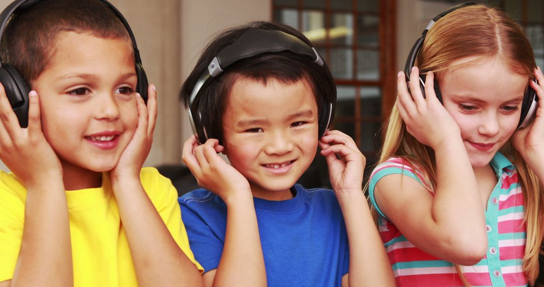 Diverse Group of Kids Enjoying Music with Headphones - Free Images, Stock Photos and Pictures on Pikwizard.com