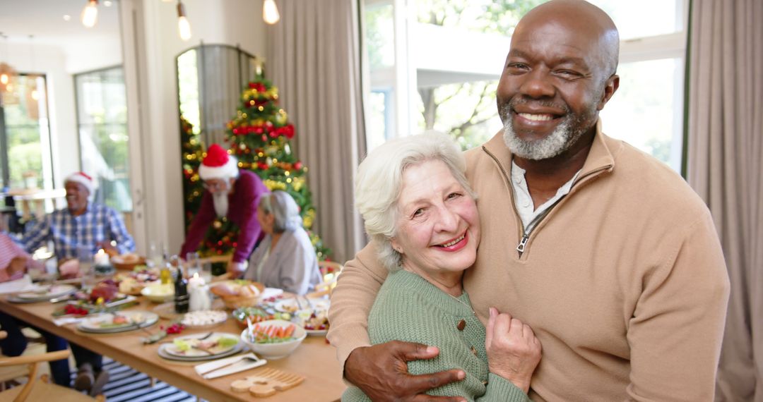 Interracial Senior Couple Celebrating Christmas with Family at Home - Free Images, Stock Photos and Pictures on Pikwizard.com