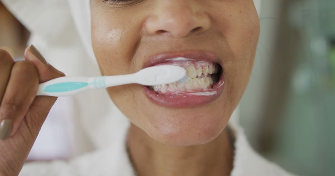 Close-Up of Woman Brushing Teeth for Oral Hygiene Routine - Free Images, Stock Photos and Pictures on Pikwizard.com