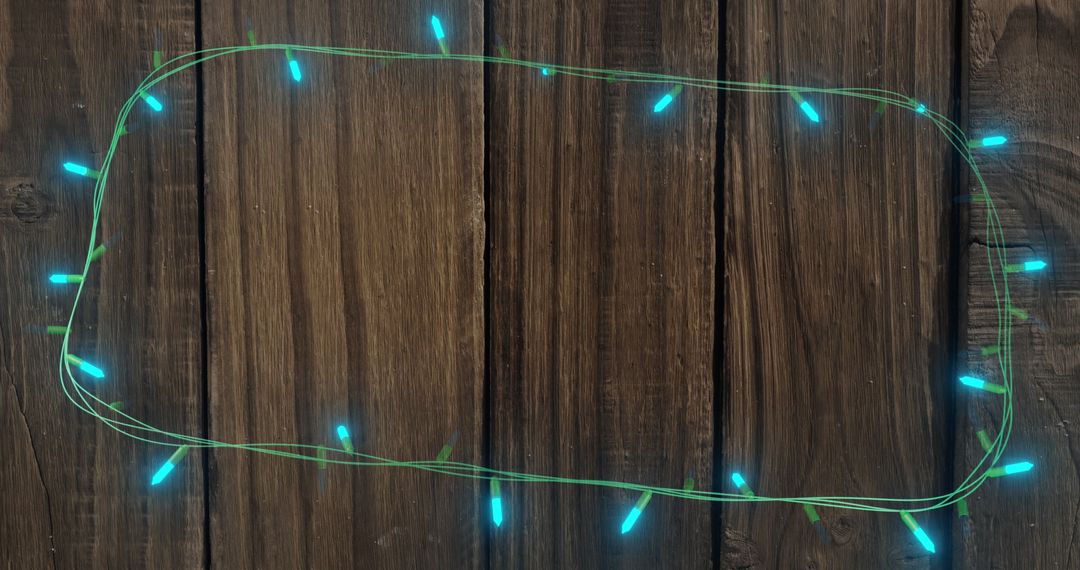 Flickering Fairy Lights on Wooden Background with Copy Space - Free Images, Stock Photos and Pictures on Pikwizard.com