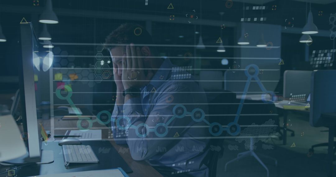Stressed Businessman Managing Financial Data at Office Desk