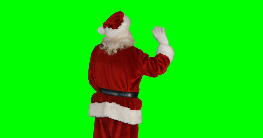 Santa Claus Waving Long White Beard Santa Hat Green Background - Free Images, Stock Photos and Pictures on Pikwizard.com