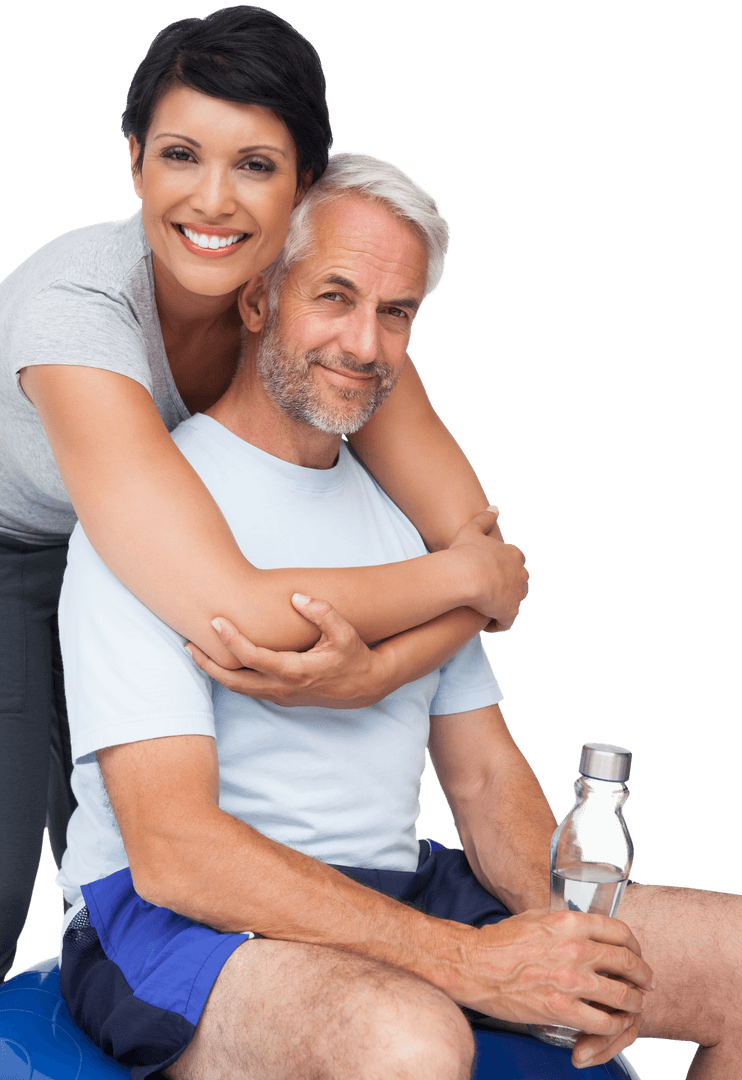 Happy Couple Embracing with Water Bottle Smiling