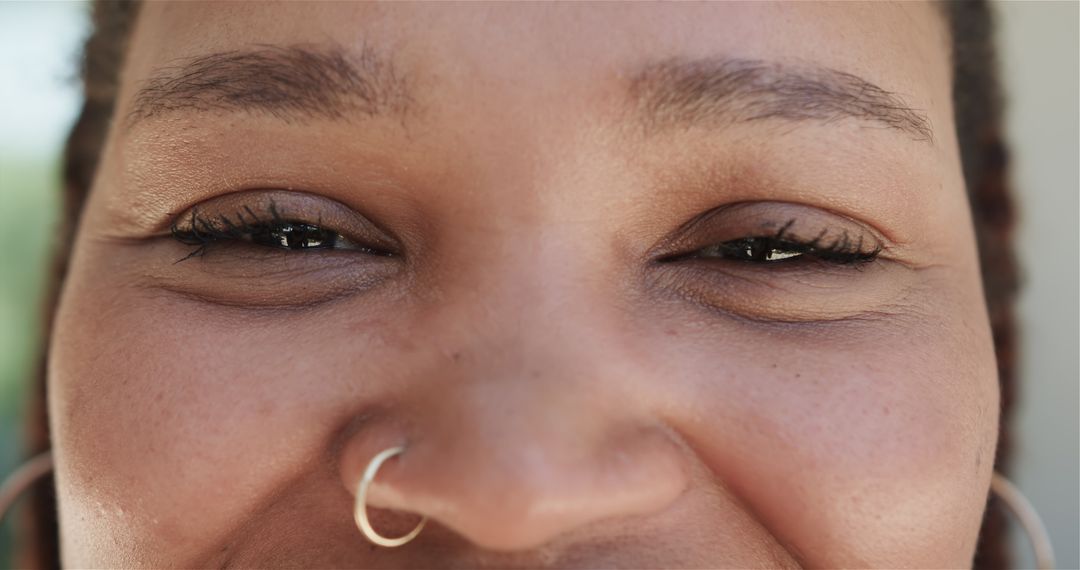 Close-Up of Young Woman Smiling with Joyful Expression