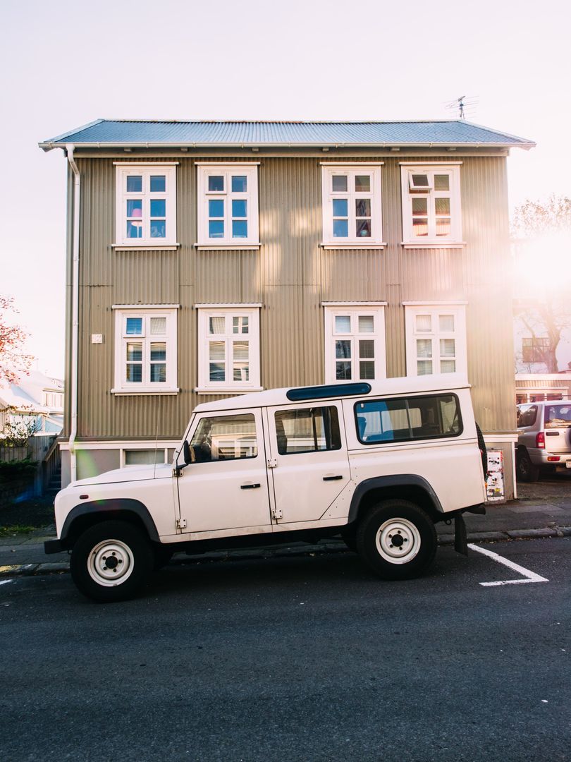 Classic Land Rover in Front of Rustic Icelandic Building