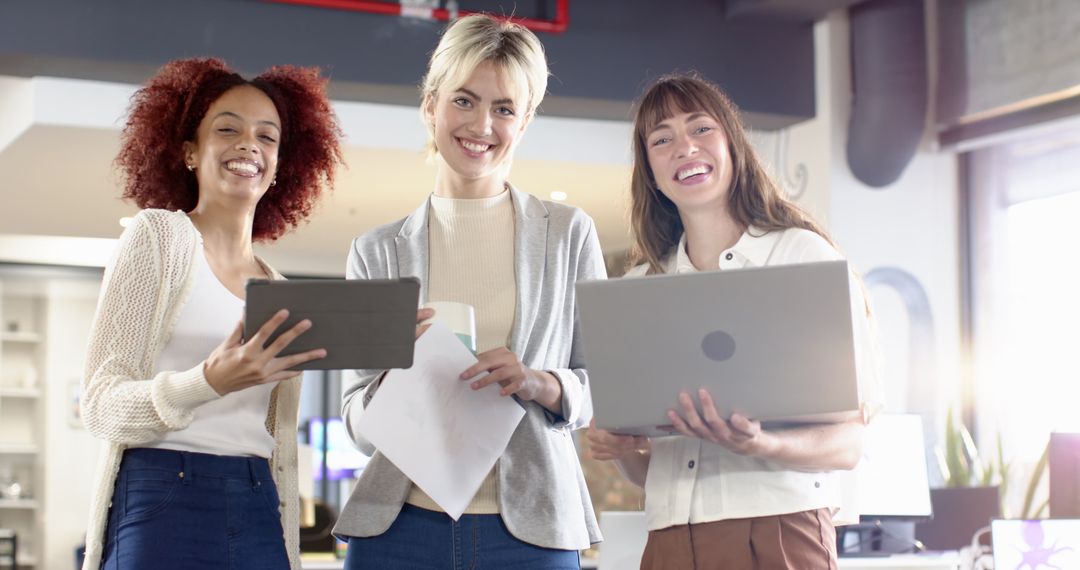 Diverse Female Team Collaborating in Open Office