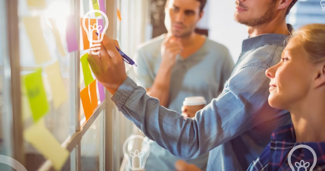 Creative Team Brainstorming with Floating Light Bulbs