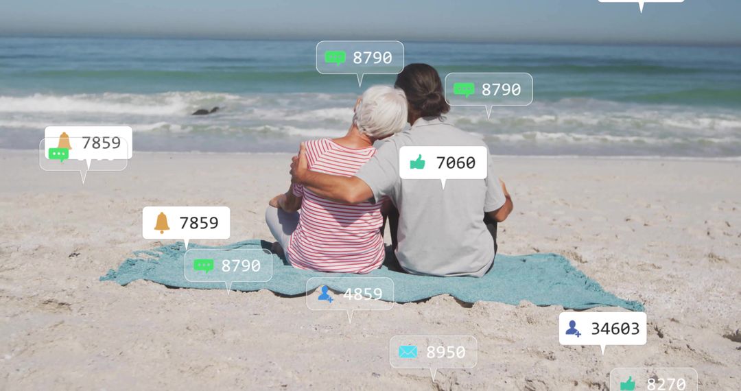 Senior Couple Connecting Digitally While Relaxing on Beach