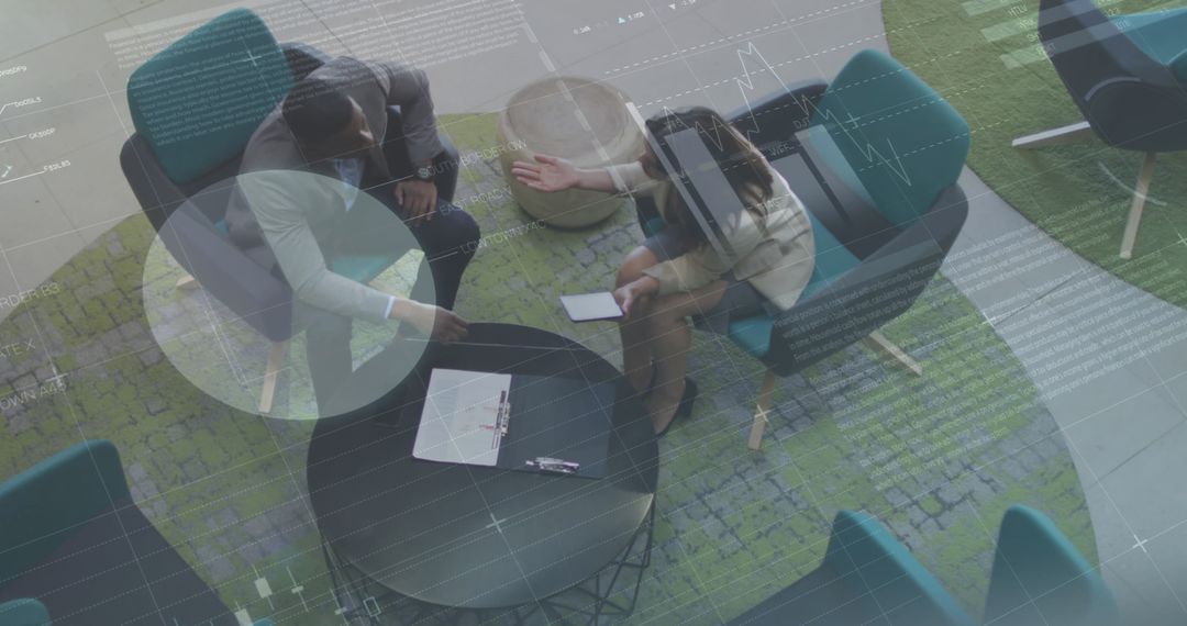 Business Professionals Discussing Amid Digital Interface Overlays