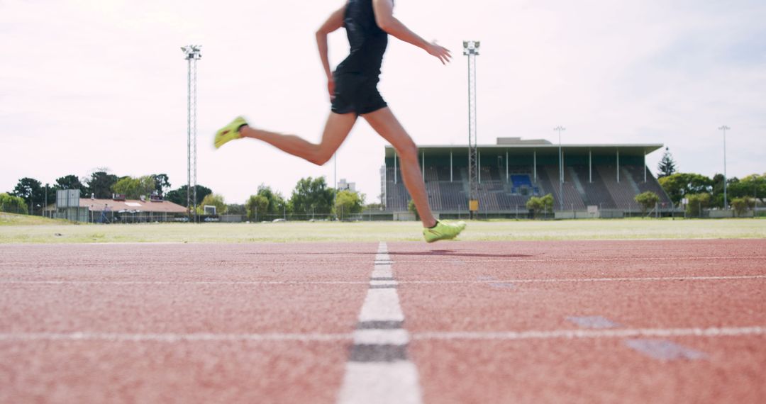 Athlete running on track during training session - Free Images, Stock Photos and Pictures on Pikwizard.com