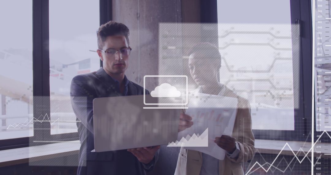 Diverse Colleagues Analyzing Digital Financial Technology in Modern Office