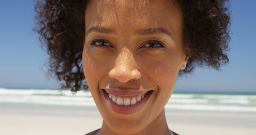 Closeup Smile of Woman on Beach - Free Images, Stock Photos and Pictures on Pikwizard.com