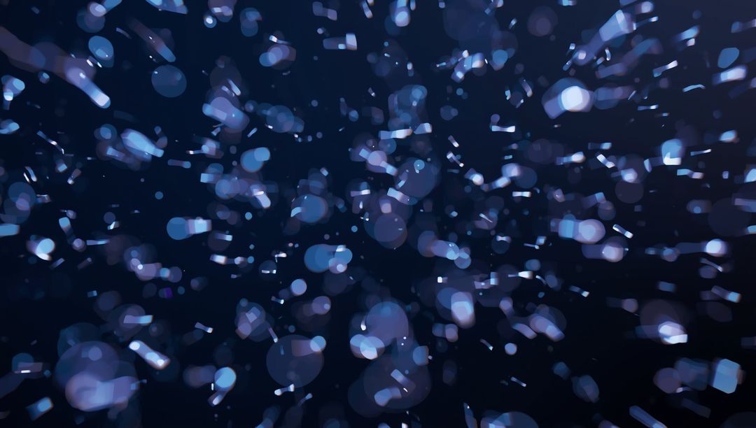 Dynamic Blue Glowing Bokeh Particles in Cosmic Digital Space