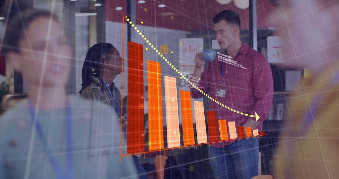 Diverse Team Analyzing Digital Data Visualization in Office