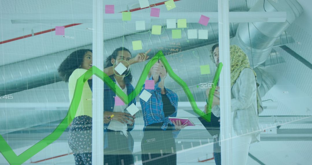 Diverse Team Collaborating on Financial Data and Digital Solutions