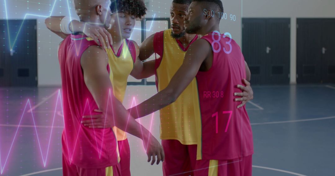 Diverse Basketball Players Analyzing Performance Data On Court