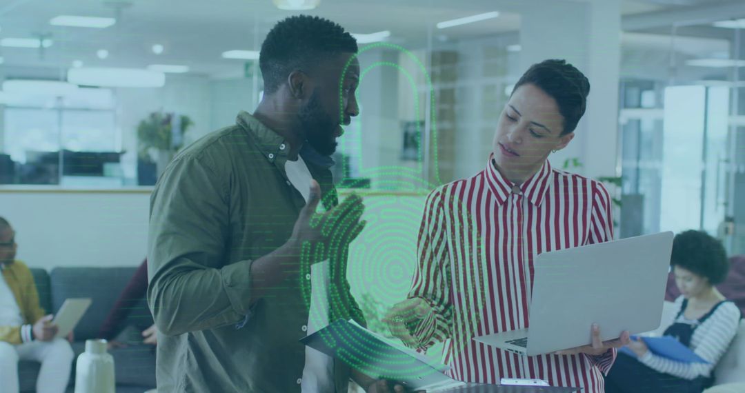 Cybersecurity Strategy Discussion in Modern Office Environment