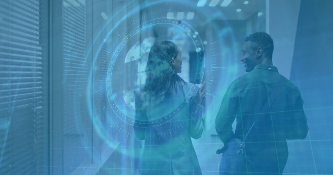 Coworkers Discussing Ideas Walking through Innovation-Inspired Office with Digital Overlay