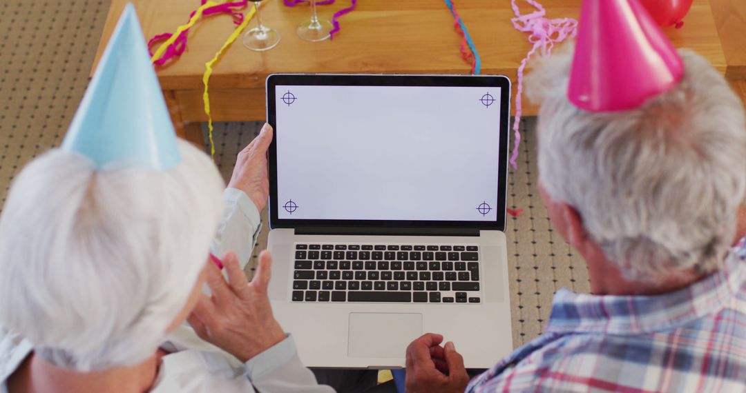 Elderly Couple Celebrating Virtual Party with Laptop - Free Images, Stock Photos and Pictures on Pikwizard.com