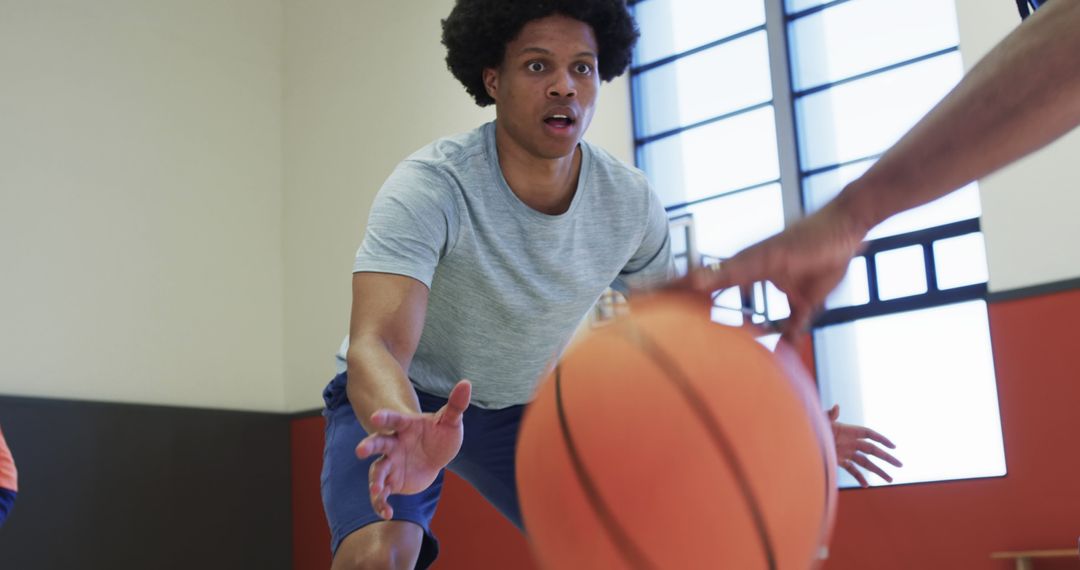 Intense Indoor Basketball Training Session with Focused Player