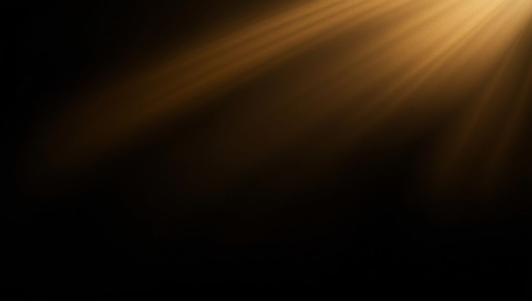 Golden Spotlight Shining on Abstract Darkness