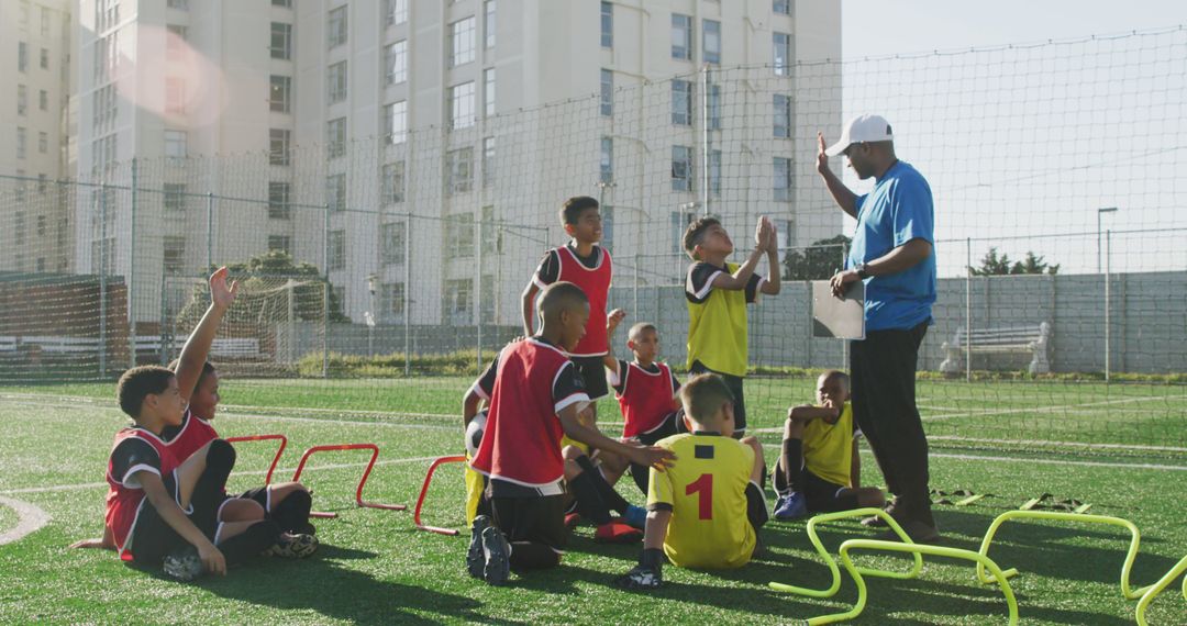 Youth Soccer Team Coaching and Training on Sunny Day - Free Images, Stock Photos and Pictures on Pikwizard.com