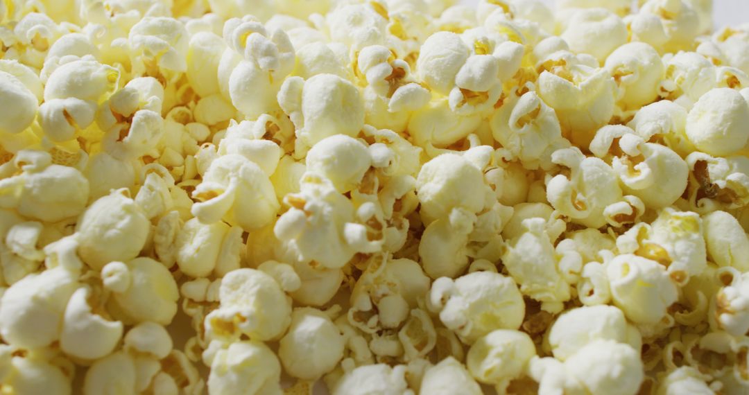 Close Up of Freshly Popped Popcorn on White Background - Free Images, Stock Photos and Pictures on Pikwizard.com