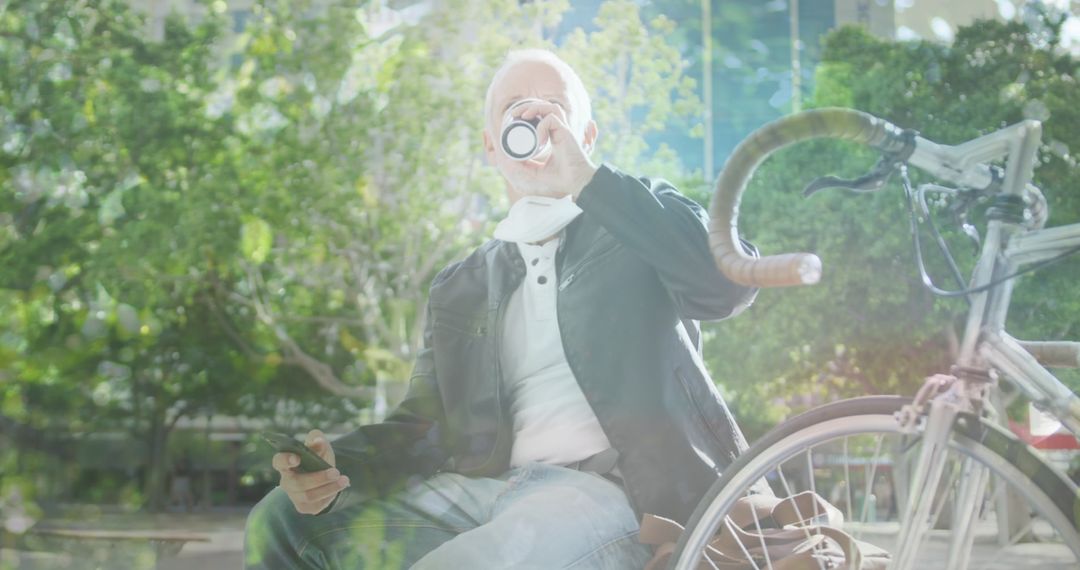Man on Break Enjoying Coffee with Bicycle