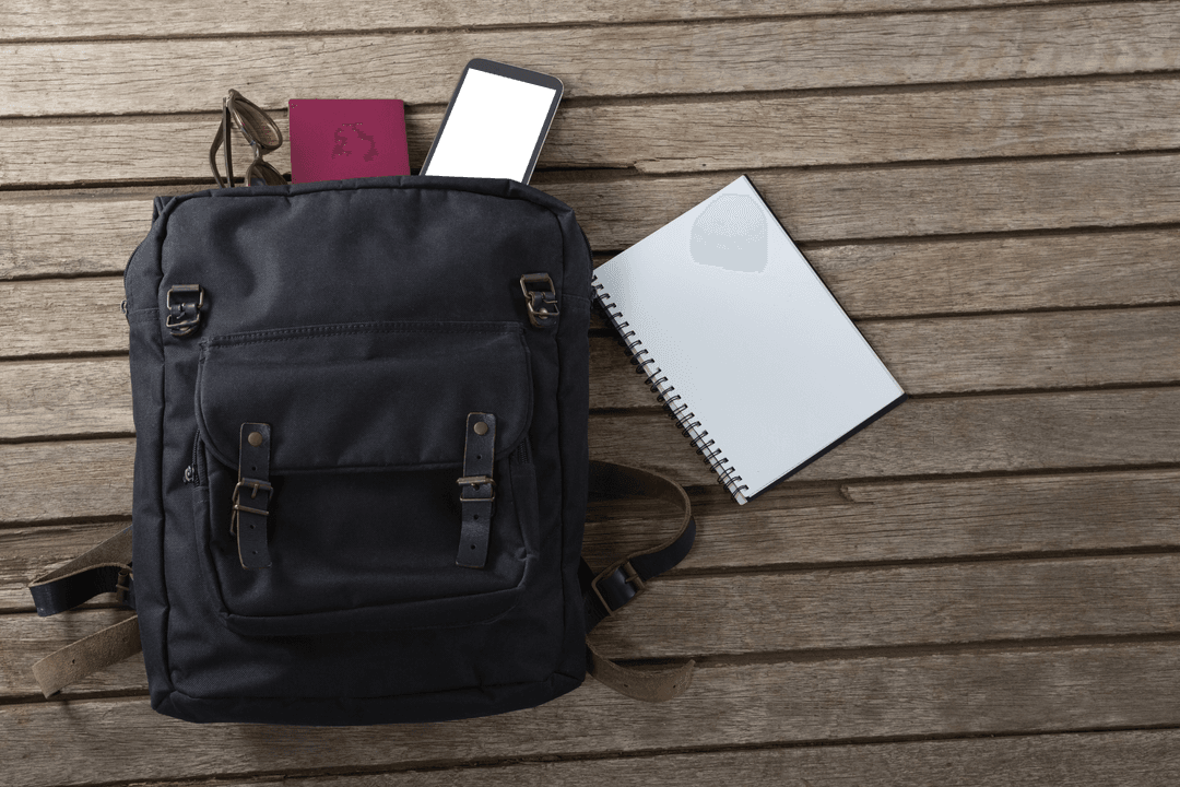 Transparent Image of Backpack with Everyday Essentials on Wooden Floor