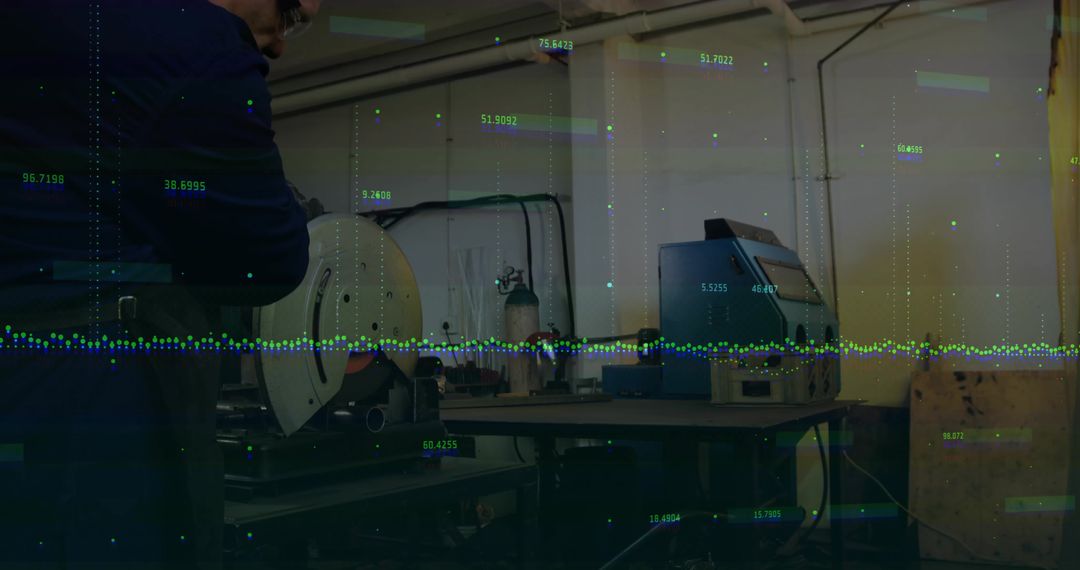 Industrial Worker Grinding Metal with Data Overlay in Workshop