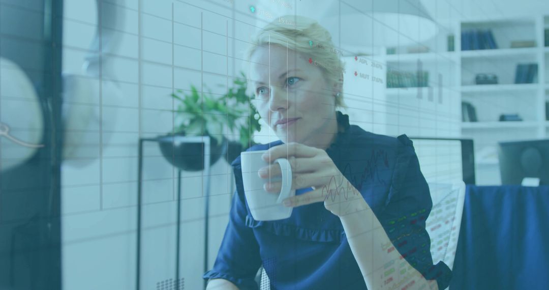 Business Executive Reviewing Metrics in Modern Office