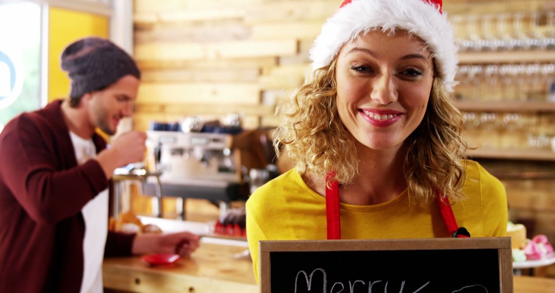 Smiling Barista in Santa Hat Serving Coffee During Holiday Season - Free Images, Stock Photos and Pictures on Pikwizard.com