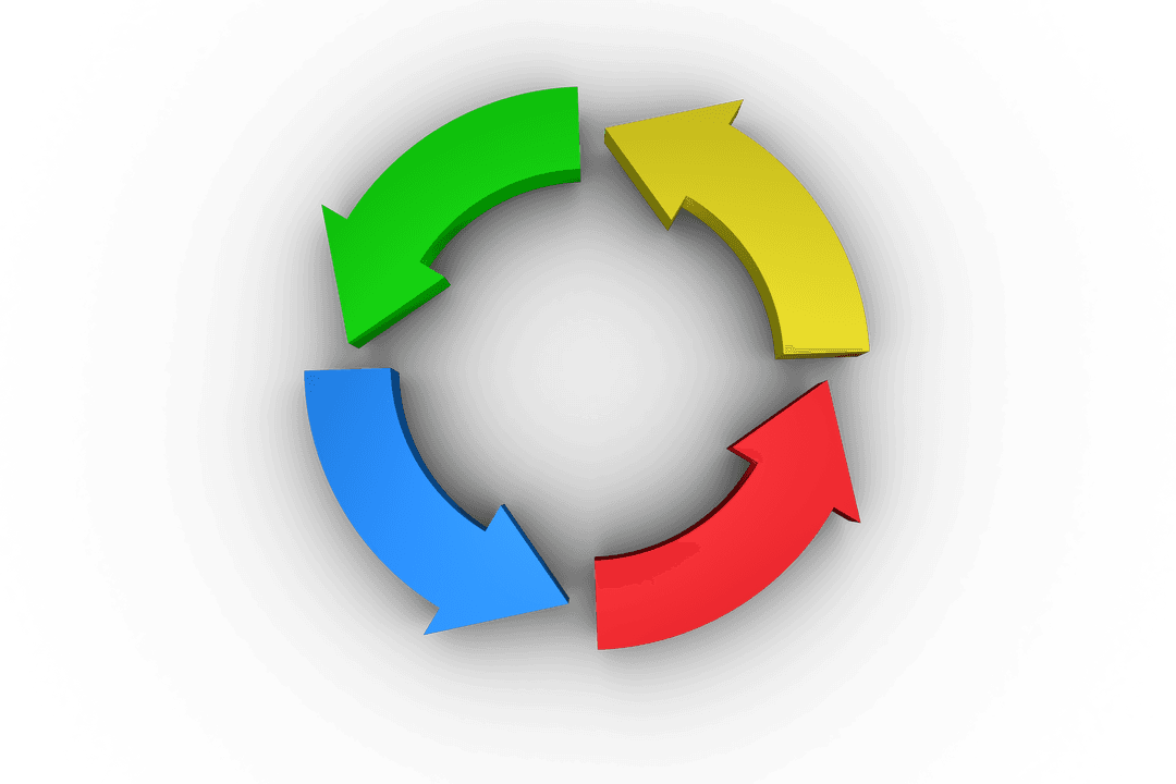 Colorful Rotating Arrows Icon on Transparent Background