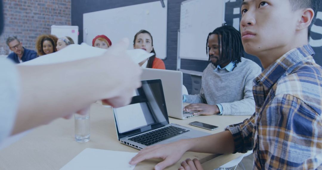 Diverse Team Meeting with Technology Integration Concept