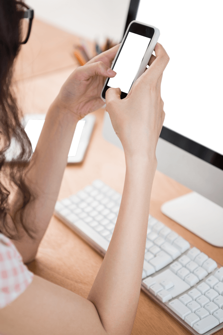 Woman Using Smartphone with Transparent Screen at Office Desk