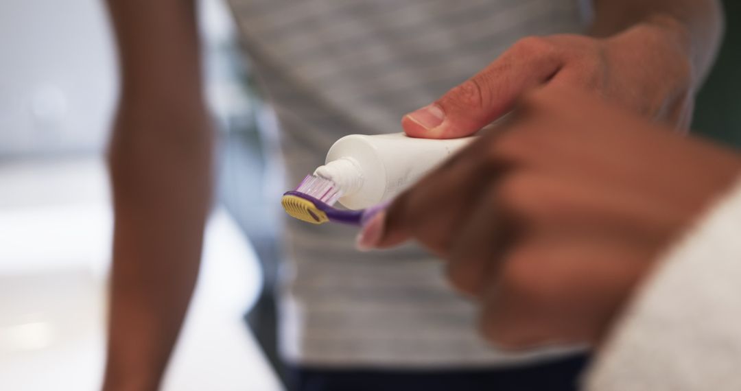 Applying Toothpaste on Toothbrush for Daily Oral Hygiene