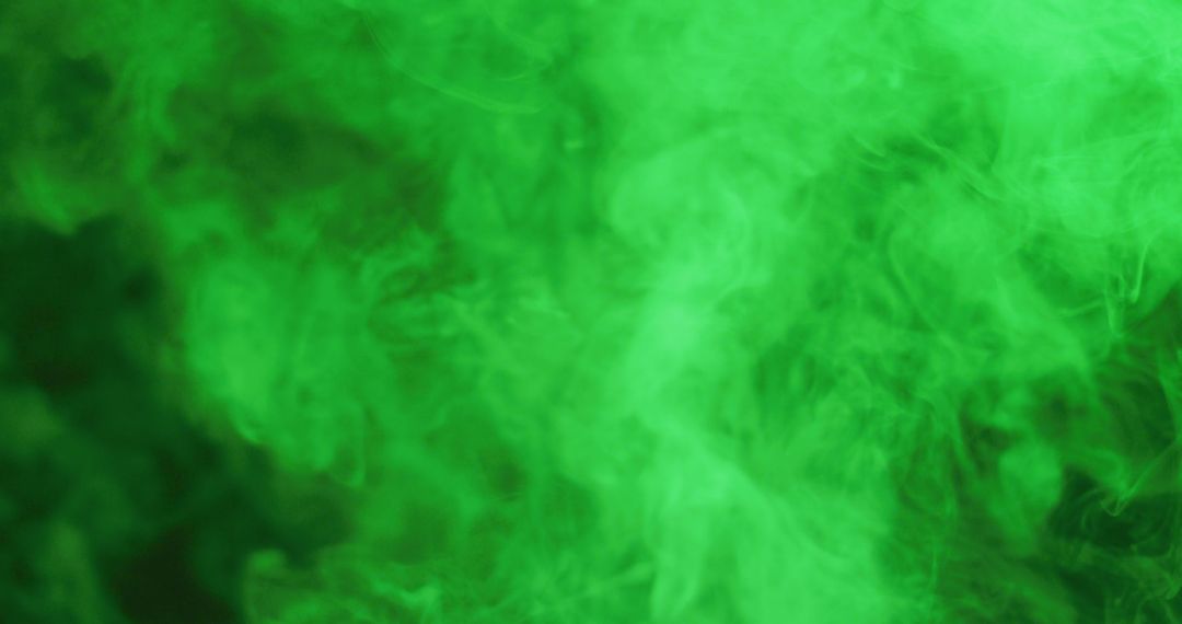 Vibrant Green Smoke Clouds Creating Abstract Pattern