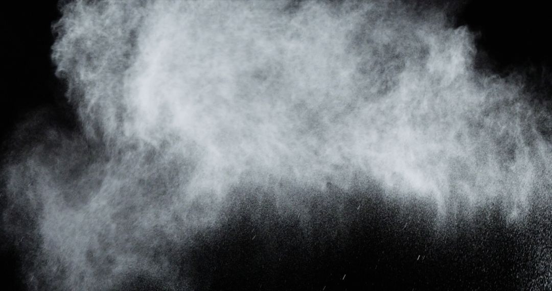 A cloud of white powder bursts against a dark background, with copy space - Free Images, Stock Photos and Pictures on Pikwizard.com