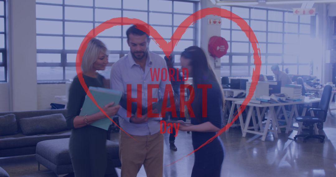 Colleagues Discussing on World Heart Day in Modern Workspace