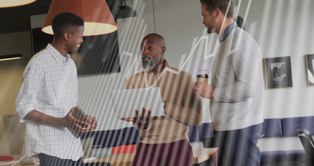 Diverse Team Collaborating with Digital Technology in Modern Office