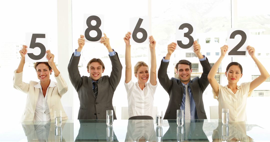 Business People Holding Numbers During Office Team Activity Event - Free Images, Stock Photos and Pictures on Pikwizard.com